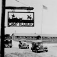 From Herbert Maier's "The Library of Original Sources," Sign for CCC company, Lake Corpus Christi State Park, c. 1938